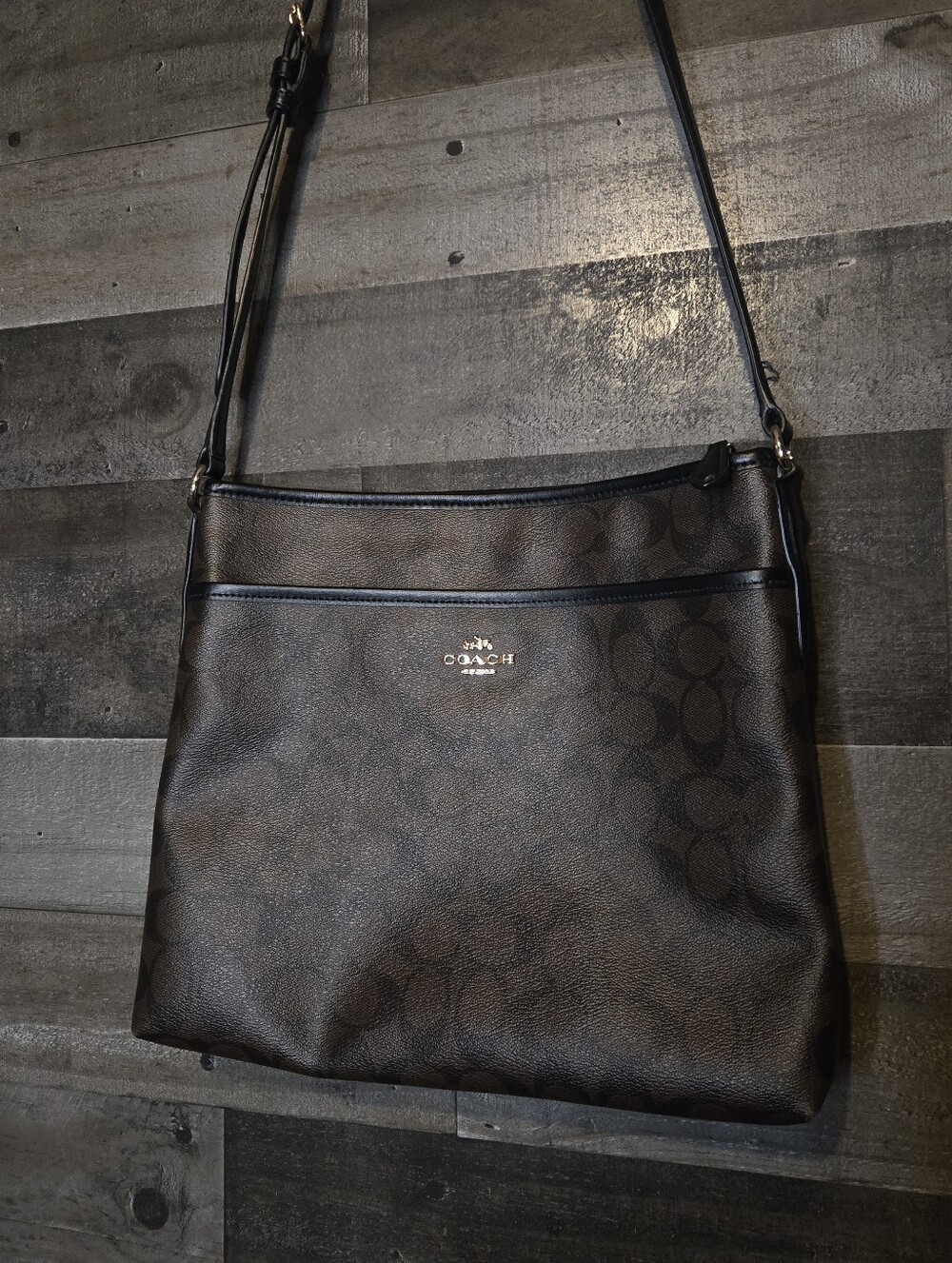 Coach brown and black crossbody bag